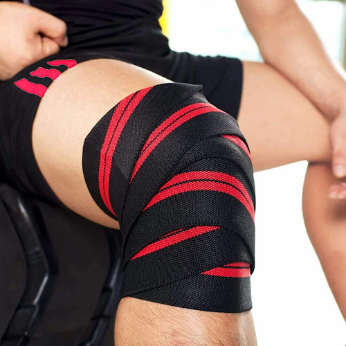 Deportista usando vendas Body Alive en sentadillas